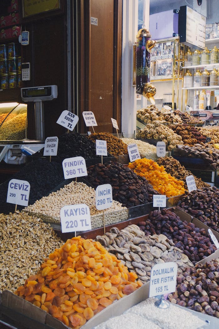 A vibrant display of various dried fruits and nuts at a Turkish bazaar, showcasing local delicacies.